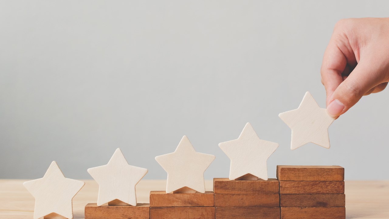 A series of wooden stars trending up