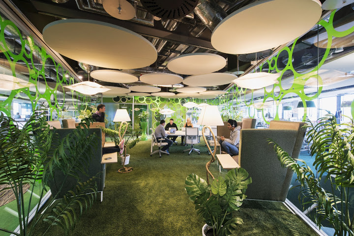 Wide angle view of green open plan office